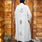 Tie Shop Remal Cardigan back view with Whirling Dervish and Hamsa Hand embroidery. كارديجان رمال أوف وايت بتطريز الدراويش وكف الفاطمية من تاي شوب.