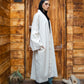 Tie Shop Remal cardigan side drape and frayed hem detail. كارديجان رمال بتفاصيل أطراف منسلة وقصة مريحة من تاي شوب.