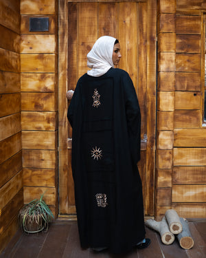 Tie Shop Black Remal Cardigan back view with gold embroidered symbols. كارديجان رمال أسود مفتوح بتطريز فرعوني ورموز ذهبية خلفية من تاي شوب.