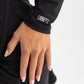 Black Shell Suit by Tie Shop front view