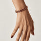 Tie Shop Stylish Bracelet gold structured link chain bracelet close-up. أساور نسائية من تاي شوب ستايلش براسليت بسلسلة ذهبية مجدولة، مجوهرات وإكسسوارات أنيقة.