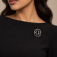 Silver Zia Pin brooch on black dress by Tie Shop. بروش فضي أنيق للمناسبات والفساتين.