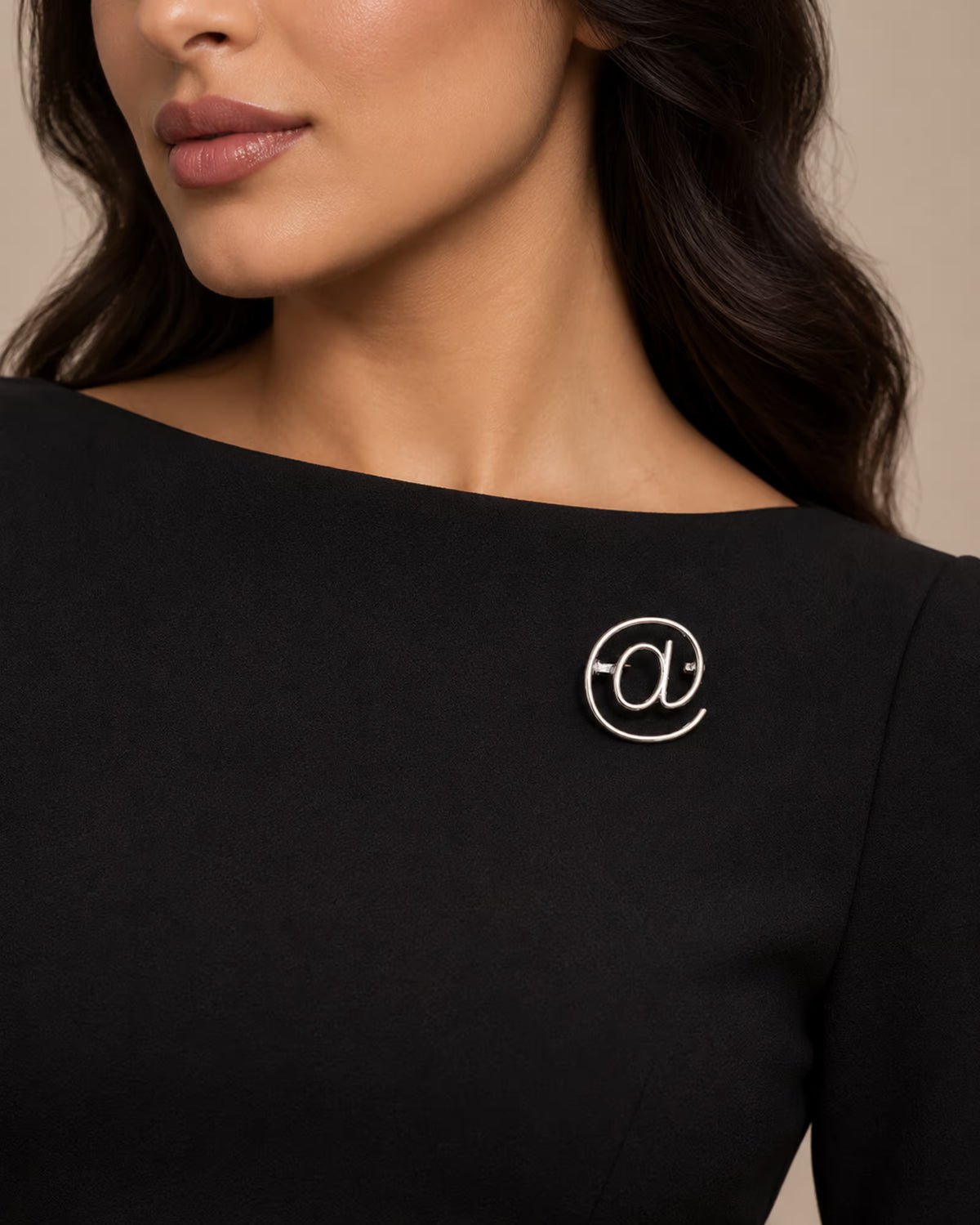 Silver Zia Pin brooch on black dress by Tie Shop. بروش فضي أنيق للمناسبات والفساتين.