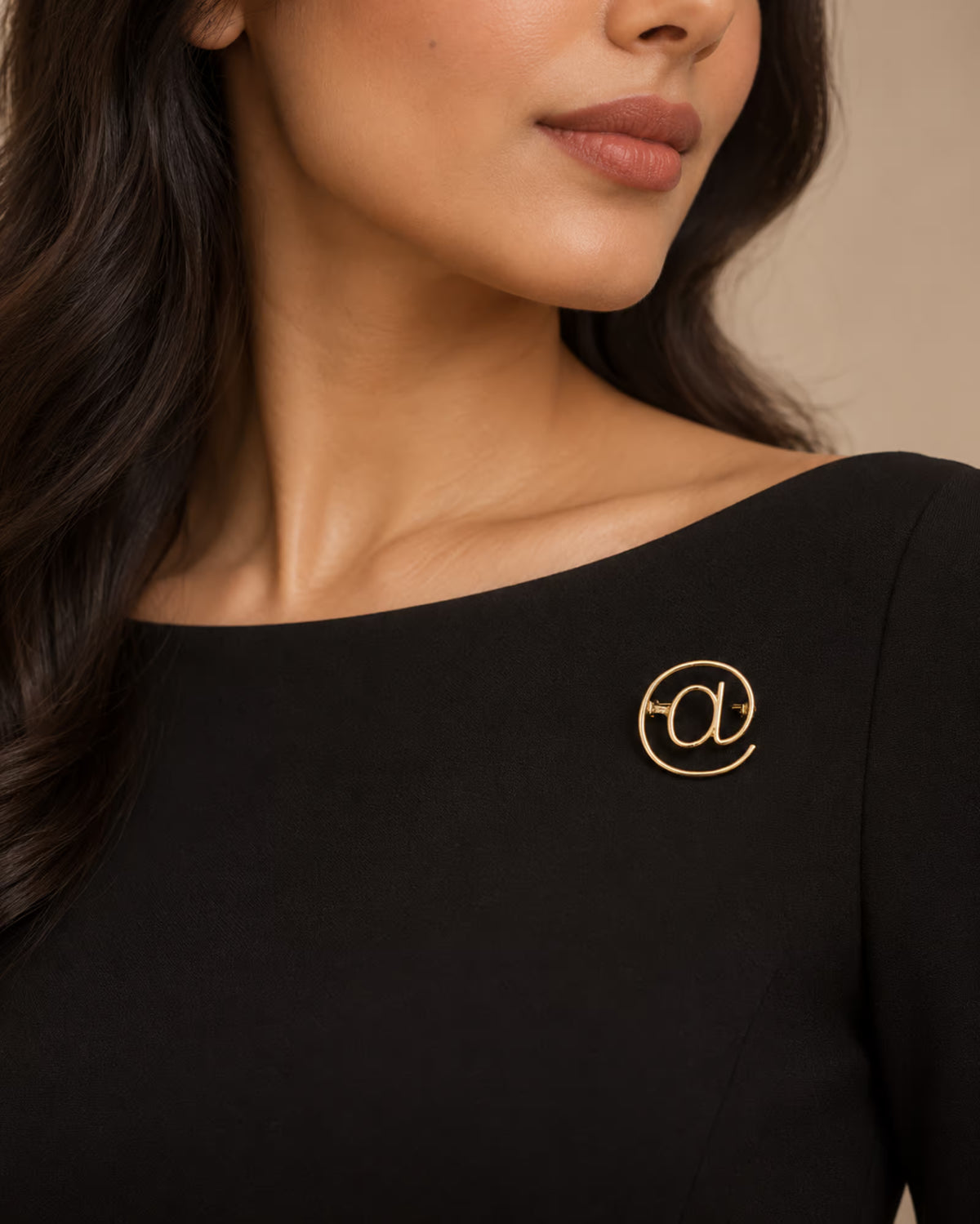 Gold Zia Pin brooch on black dress by Tie Shop. بروش دهبى أنيق للمناسبات والفساتين.